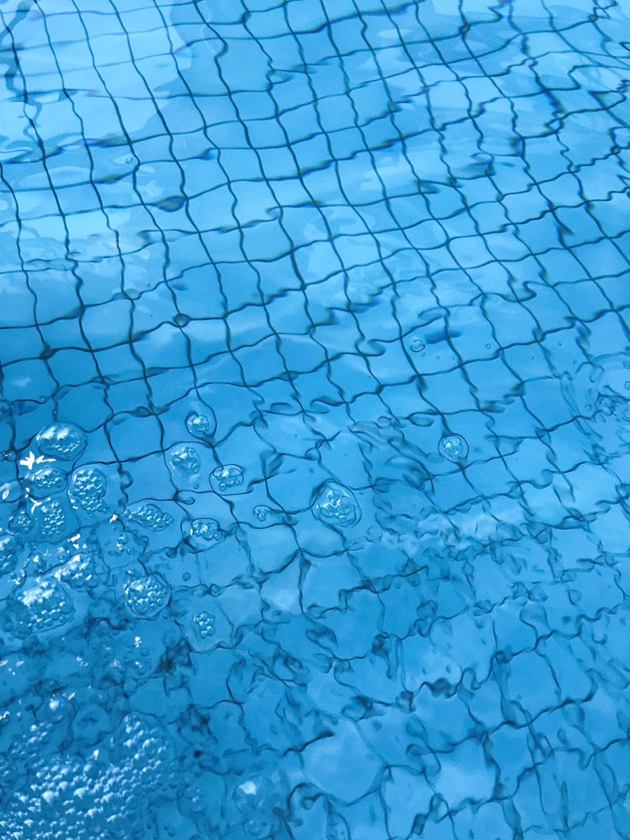 Clean blue swimming pool water